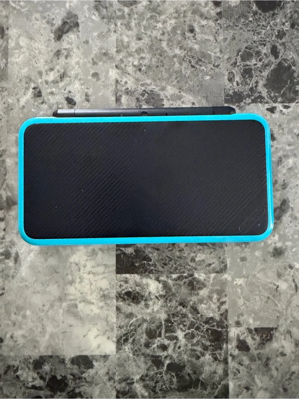 Nintendo Dual-Screen Handheld Console in Black with Teal Buttons